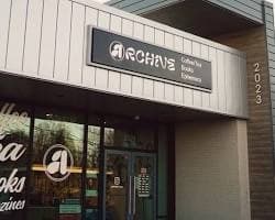 Archive CLT storefront with its sign and entrance on Beatties Ford Road.