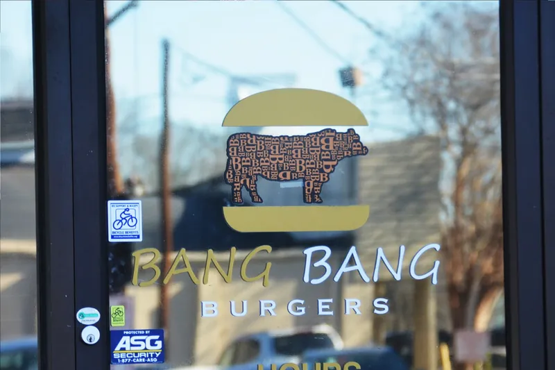 Glass entrance and sign at Bang Bang Burgers in Charlotte