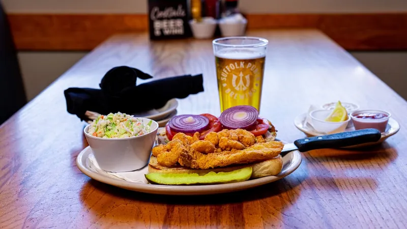 A sandwich, fries and slaw at Eddie’s Place in Charlotte