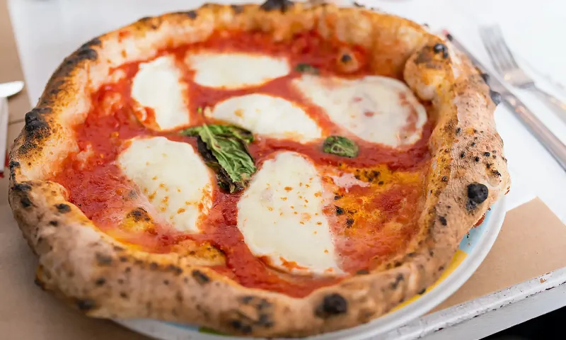 A tomato, mozzarella and basil pizza at Inizio Pizza Napoletana in Charlotte