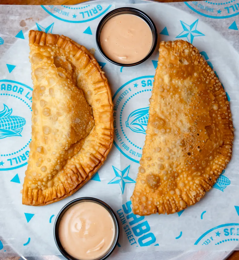 Empanadas and dipping sauce at Sabor Latin Street Grill in Charlotte