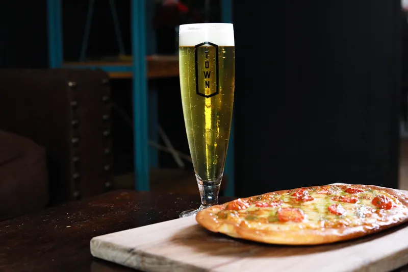 Pizza and a glass of beer at Town Brewing Co. in Charlotte